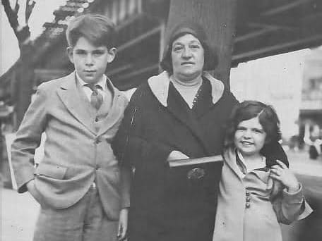 Black-and-white image of Chaia’s great-uncle, great-grandmother, and grandmother below a bridge in Borough Park c. 1933.